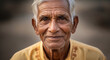 © Mirivox - Close-up portrait of an elderly man's face, showcasing deep wrinkles and a gentle smile, symbolizing wisdom and life experience, representing humanity and cultural heritage