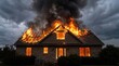 © Tommy Studio - A dramatic night scene of a two-story home burning with intense fire destroying the roof and windows.