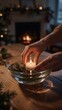 © Raihana - Generative AI person placing a lit candle into a glass bowl on a wooden table