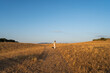 © ADDICTIVE STOCK - Woman and dog enjoy quality time in rural countryside