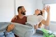 © ADDICTIVE STOCK - Happy couple celebrate new home with house keys