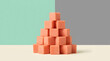 © Muzahidul - Pyramid stack of pink square blocks arranged on a twotone pastel background