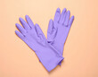 © southwind - Purple rubber gloves for household cleaning protection and hygiene