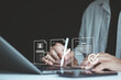 © MUNTHITA - Online registration concept. Businessman using laptop with digital user profile form. Secure signup process, account creation, identity verification, paperless system, enrollment for business platform