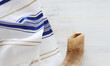 © Saepul - Traditional Jewish Prayer Shawl and Ram Horn Shofar for Rosh Hashanah and Yom Kippur Religious Holiday Observance