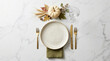 © Nk graphic23 - Thanksgiving place setting with pumpkin and autumn leaves on marble