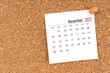 © Southtownboy Studio - White calendar sheet for November 2027 with thumbtack on board, Position with copy space.