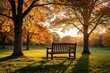 © Pete - Empty wooden bench sits under large trees with bright autumn leaves. Golden sunset light shines through orange foliage in peaceful public park. Scenic landscape with green grass, fallen leaves