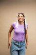 © STOCKEROcr - Happy young woman laughing wearing casual attire