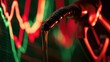 © PinkiePie - Fuel nozzle dripping crude oil, glowing red and green financial graph, dramatic lighting