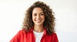 © GODSE - Portrait of a beautiful smiling woman with curly hair wearing a red shirt isolated on white background