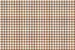 © MdRiyadull - Seamless brown and cream gingham checkered fabric texture for cozy home textile.