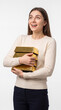 © ENDRY - Woman happily holding gold bars.