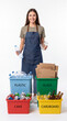 © ENDRY - Woman recycling plastic  glass.