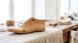 © Irina - Shoe form foot shaped wood on workbench for bespoke footwear creation. Shoe form foot shaped wood ensures comfort and precise fit for handcrafted items. Essential shoe form foot shaped wood supply.