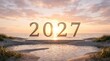 © IMAGE STORE - Golden 2027 numbers standing on a stone podium at a serene beach during a beautiful sunset, representing the upcoming new year and future goals
