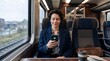 © Rajat - Woman on Train Relieved by Smartphone Notification