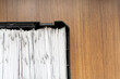 © Svetliy - Thick stack of paper documents in black storage tray on wooden tabletop. Paper archive and record keeping. Office filing and document storage. Administrative paperwork, business records