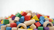 © MOHAMMAD - Pile of colorful wooden building blocks in various shapes and sizes wooden blocks toy blocks