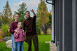 © ronstik - Family viewing modern new house before buying