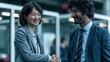 © Surachetsh - Professional greeting shows people shaking hands when meeting or being introduced. It represents a polite welcome, mutual respect, and a new connection.