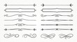 © Muhammad - Vintage ornamental dividers and flourishes line set. Black ink scrollwork elements