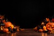 © MdShahriar - A festive halloween background featuring carved pumpkins and glowing candles on a dark wooden surface with plenty of empty copy space
