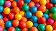 © Honey - Vibrant colorful plastic spheres playfully stacked together, creating a joyous texture representing fun and childhood moments