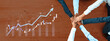© InfiniteFlow - A diverse team of professionals united in collaboration, showcasing hands together over a growth chart symbolizing successful business strategies and teamwork efforts. Scalp