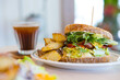 © leungchopan - Close up shot of artisan sandwich with fried potato wedges 