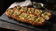 © Marmi - Classic Garlic Bread with Herbs on Dark Slate, crispy golden edges and soft buttery center presented in dramatic restaurant-style lighting