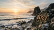 © Nurjahan - A scenic coastal landscape at sunset featuring the year 2027 embossed on a rugged rock formation by the ocean waves