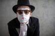 © Nomad_Soul - Close up portrait of a sad male mime wearing double glasses