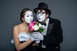 © Nomad_Soul - Mime couple holding a colorful bouquet of flowers together