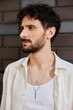 © LIGHTFIELD STUDIOS - Handsome young man enjoying a casual day outdoors in the city