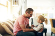 © peopleimages.com - Relax, dad and child in home with love, protection and connection for adoption and bonding. Family, people and happiness in foster care with trust, support and security in parenting and embrace