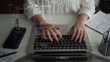 © Sirat - A person types on a laptop. Specialized coding agents coordinate planning, implementation and verification, illustrating how an AI orchestrator organizes work across software development.