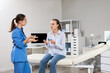 © Pixel-Shot - Asthma treatment and respiratory health, doctor explaining inhaler use to a patient during a medical consultation in a clinic office