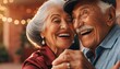 © Elena - Happy elderly couple dancing and laughing together affectionately at an outdoor evening party