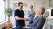 © tangmo.pa - Happy senior woman shaking hands with her dentist after successful treatment