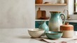 © OlgaNeuroArt - Vintage ceramic pitcher and pottery bowls on kitchen counter. Glazed turquoise tableware and earthenware jar on marble countertop