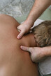 © Nika Oksenchuk/Stocksy - Person Receives a Massage in a Spa Setting During Daytime