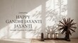 © Mojibur - Gandhi jayanti celebration background with a traditional wooden charkha spinning wheel and soft sunlight shadows on a textured wall