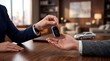 © Cyber Canvas Studio - Business person handing over car keys to a customer across an office desk