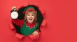 © elmaslouhi - Santa's elf on bright color background