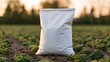 © Studio Nova - The white bag in a sunlit field of crops at dawn