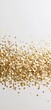 © B-design - Golden confetti scattering on white minimalist background. Gold confetti creates a sparkling, festive texture with ample copy space for design