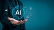 © Monayem Khan - Man holding glowing AI hologram with digital icons representing data and technology in modern business