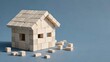 © Eva - National Roof Over Your Head Day concept with wooden house model