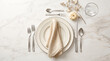 © Romjan - Elegant table setting with beige napkin and fall decor